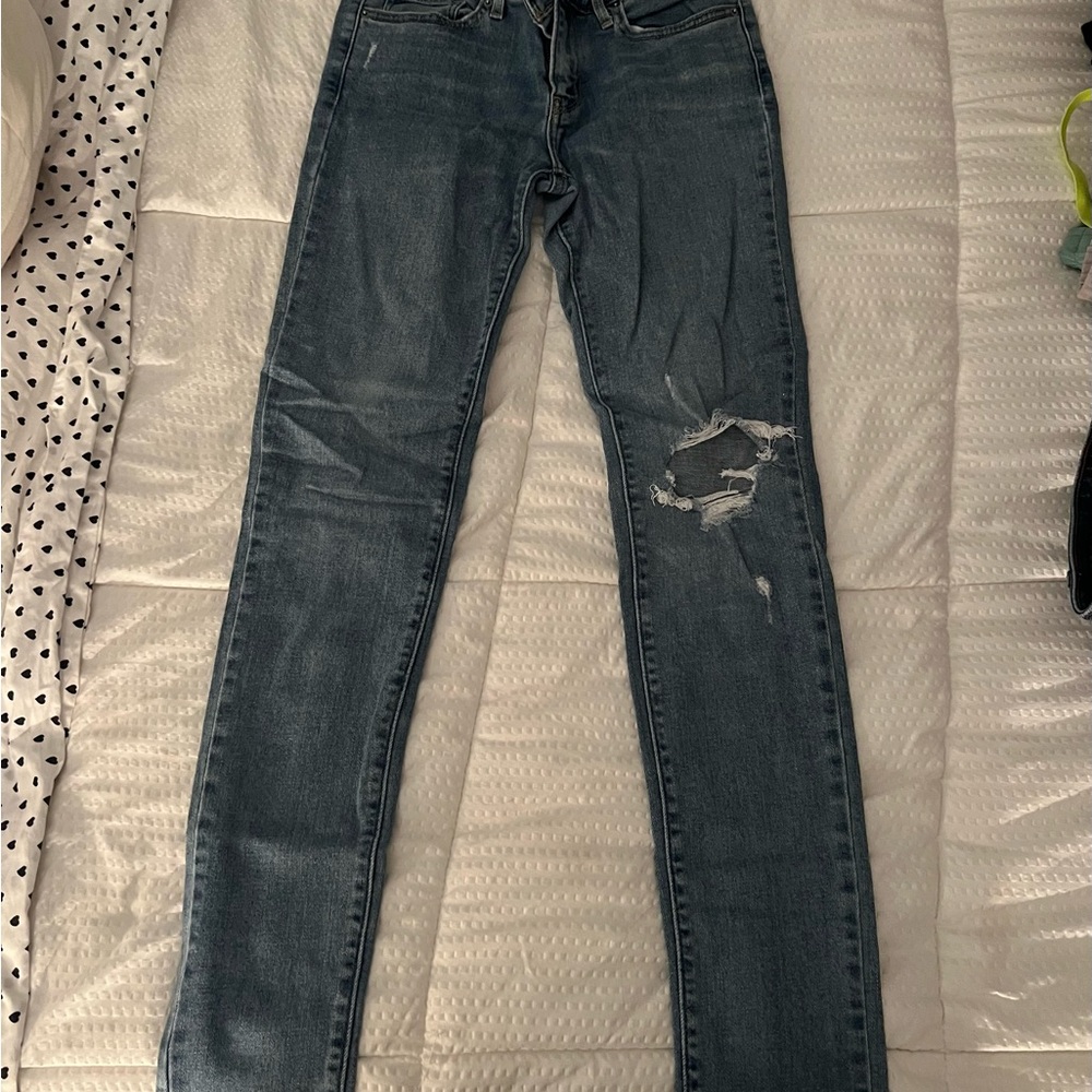 Levi Women's Distressed Blue Jeans